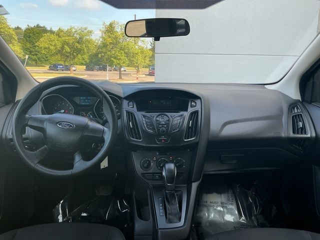 Used 2013 Ford Focus S with VIN 1FADP3E2XDL209443 for sale in Flint, MI