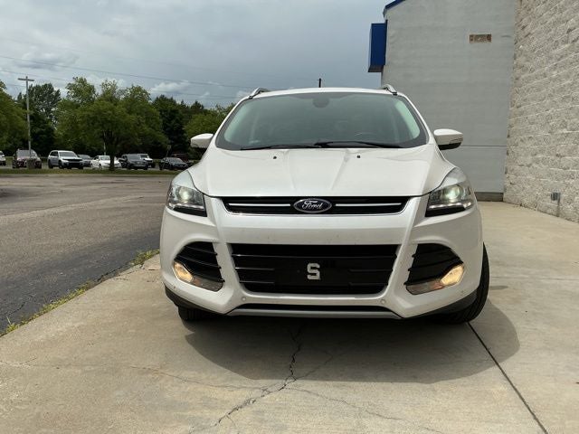 Used 2015 Ford Escape Titanium with VIN 1FMCU9J93FUA24115 for sale in Flint, MI